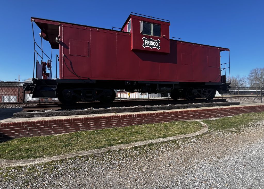 Historic Frisco caboose in Marion County town center.